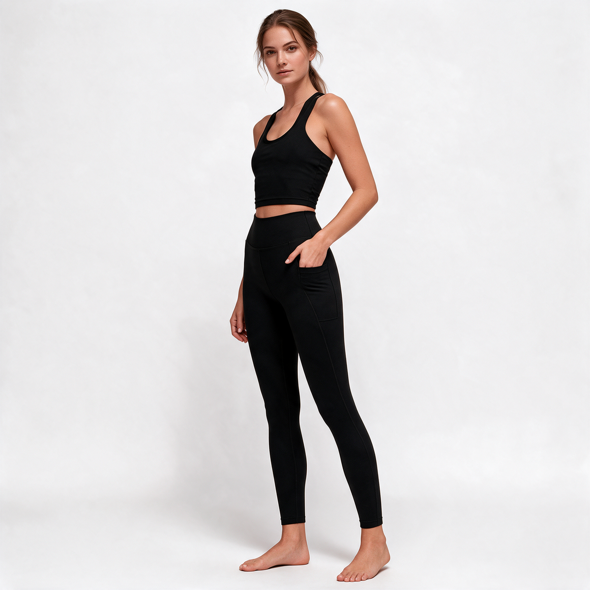 Natural Performance Pocket Leggings in Black — three-quarter pocket view