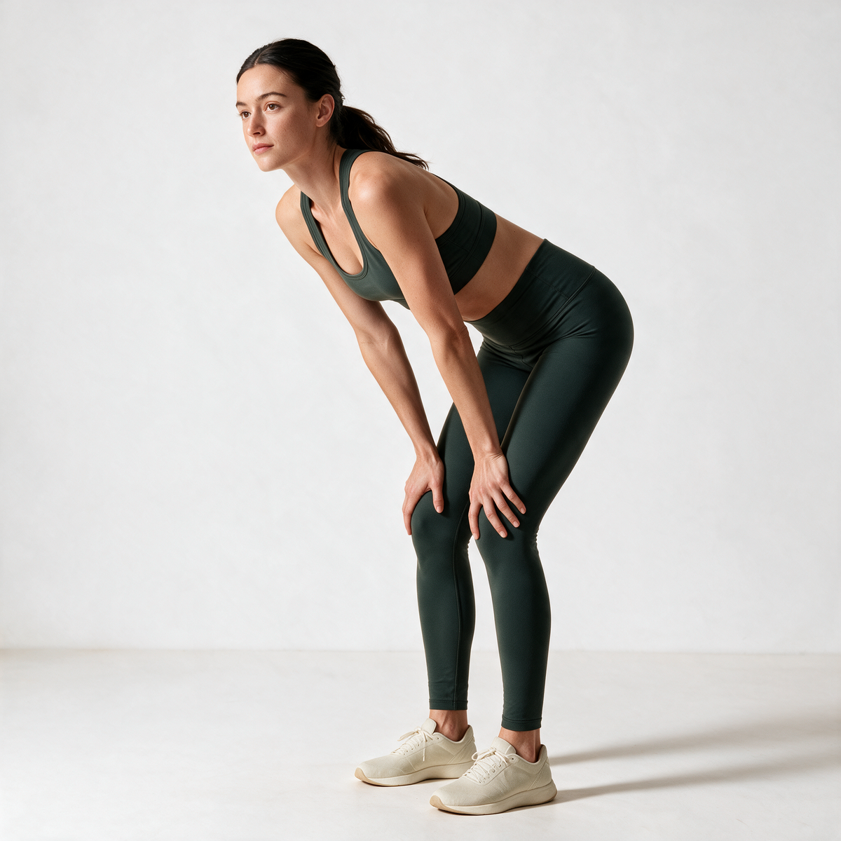 Natural Performance Full Length Leggings in Olive Green — side-profile hip hinge