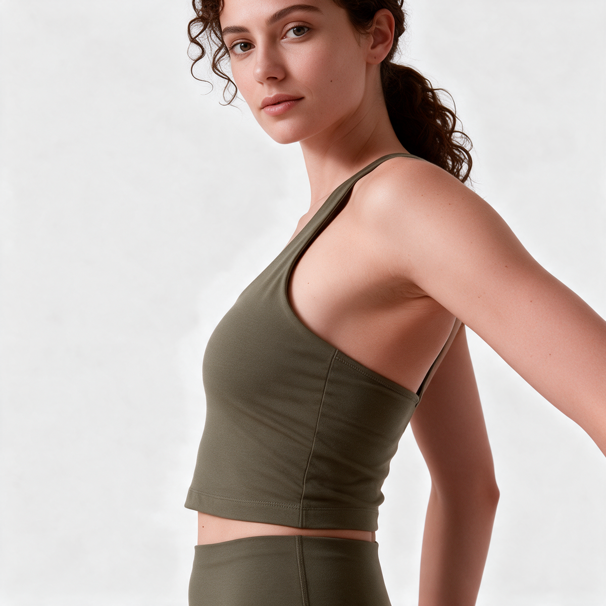 Natural Crop Racer Tank in Olive Green — armhole